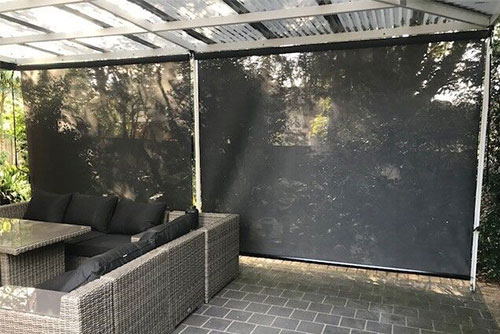 Outdoor shade screen with black fabric for awnings and outdoor blinds.