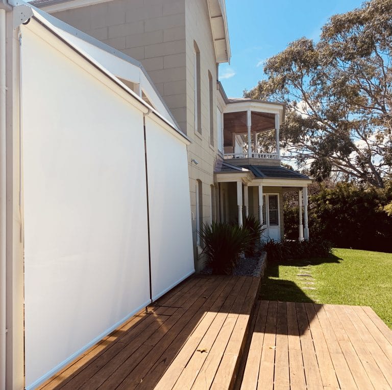 Elegant classic awnings providing shade and aesthetic appeal for residential outdoor spaces.