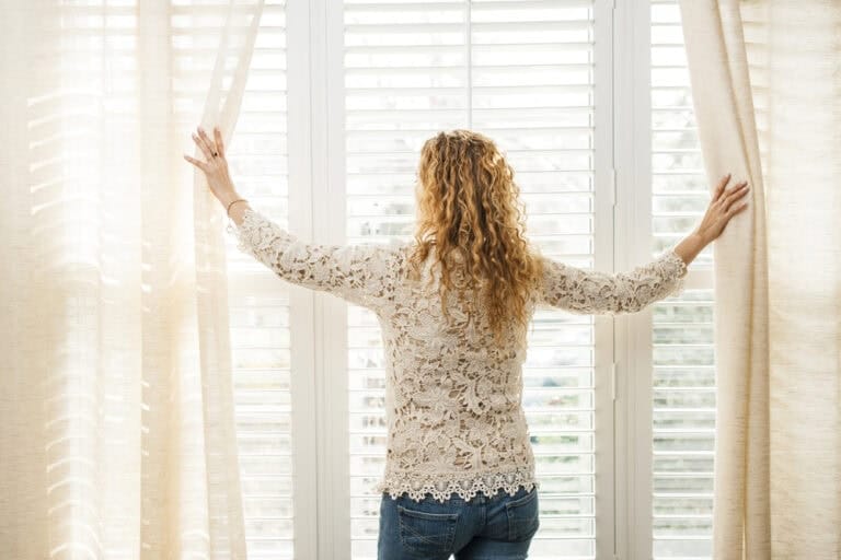 Do shutters look better with or without curtains?